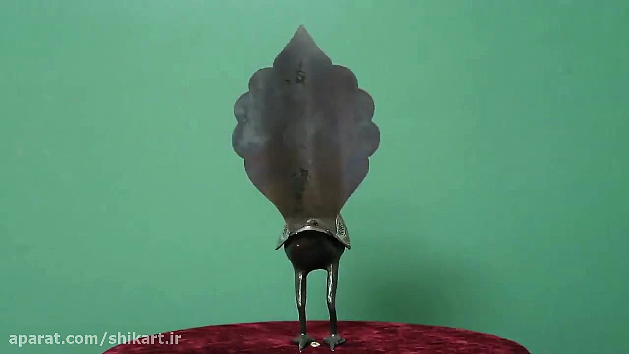مجسمه طاووس فولادی نقره کوبی ش...