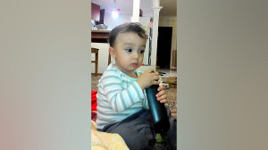 Funny baby trying to talk on t...