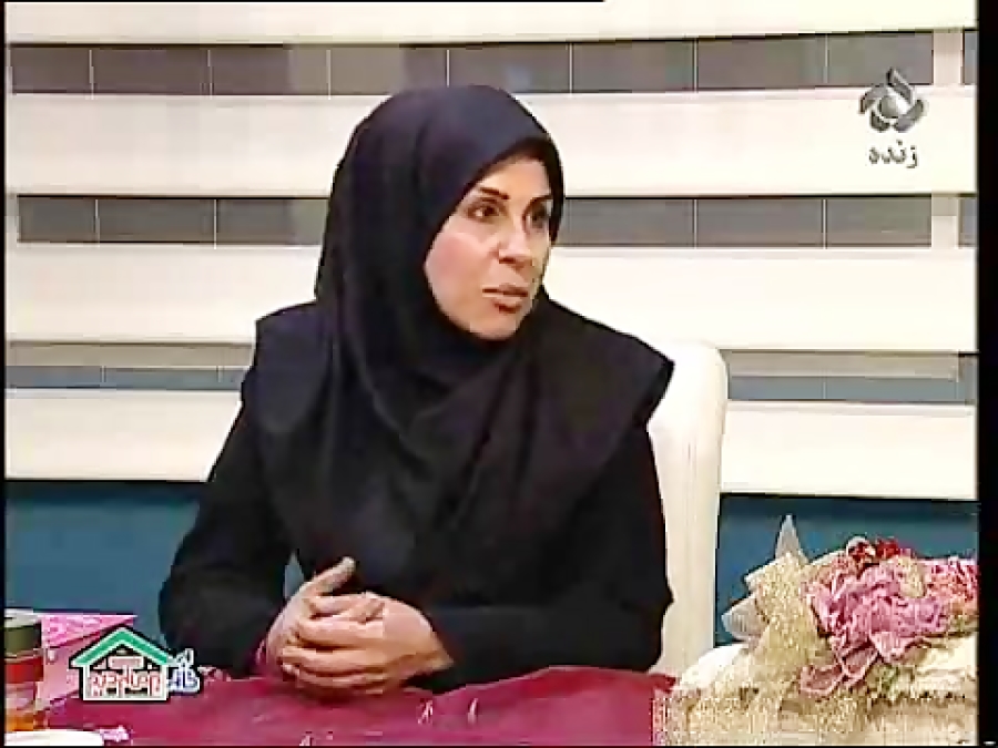 تزئین جلد قرآن با روبان