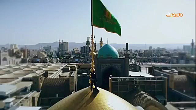 تعویض پرچم گنبد امام رضا ع در...