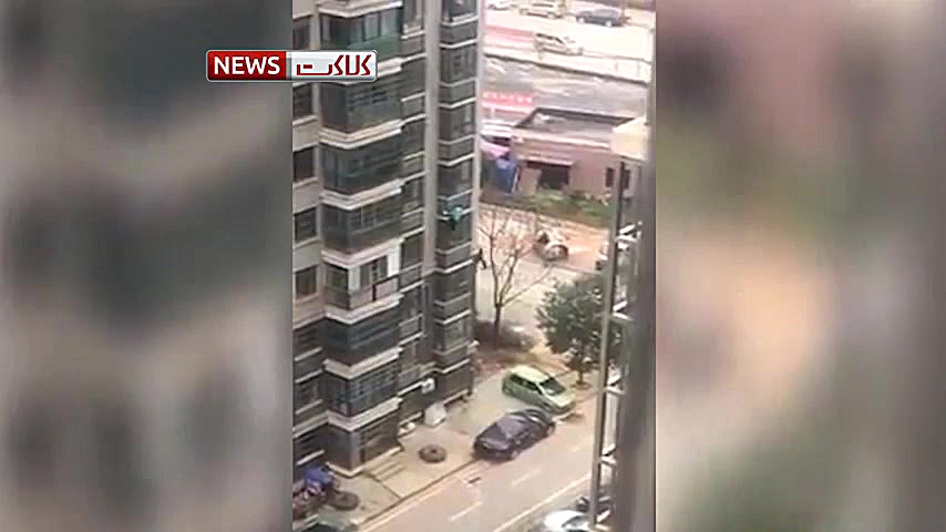 فرار عجیب زن چینی از ساختمان ق...