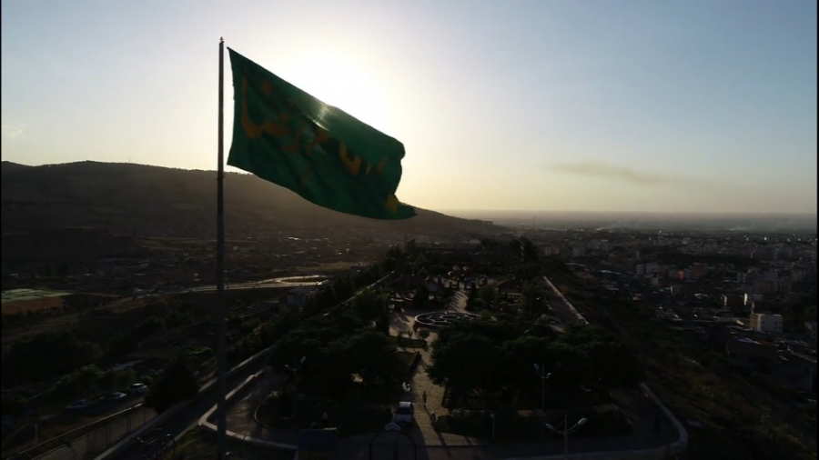 احتزاز پرچم امام رضا (ع) بر با...