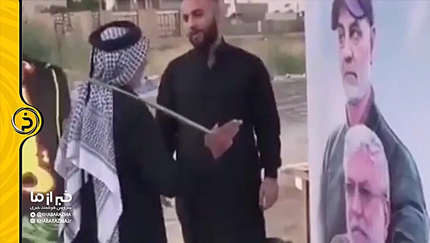 بوسیدن عکس حاج قاسم توسط زائرا...