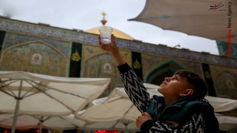 تصاویری از بارش باران در نجف ا...