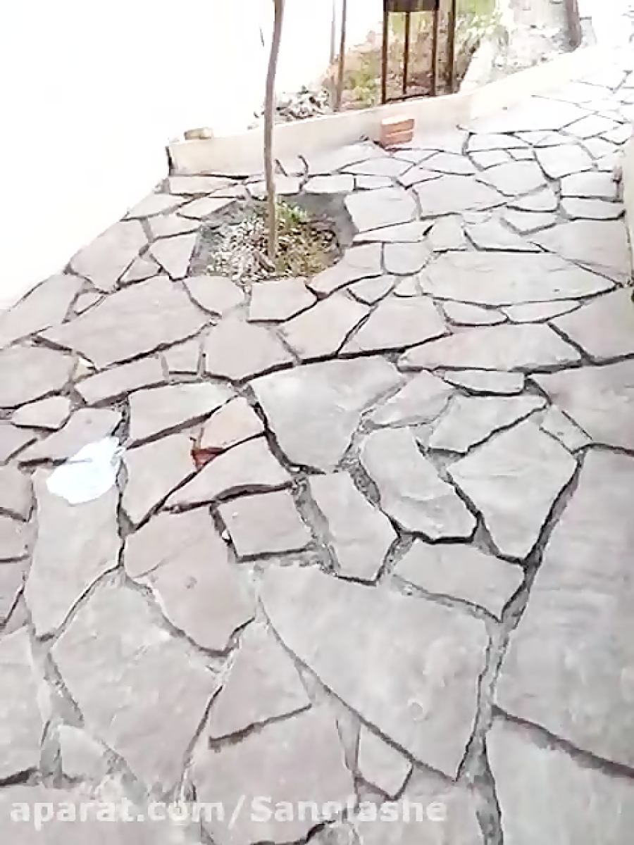 اجرای سنگ لاشه دیوار باغ کف وی...