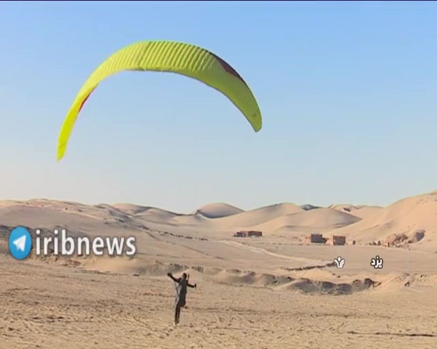 هیجان پرواز با پاراگلایدر بر ف...