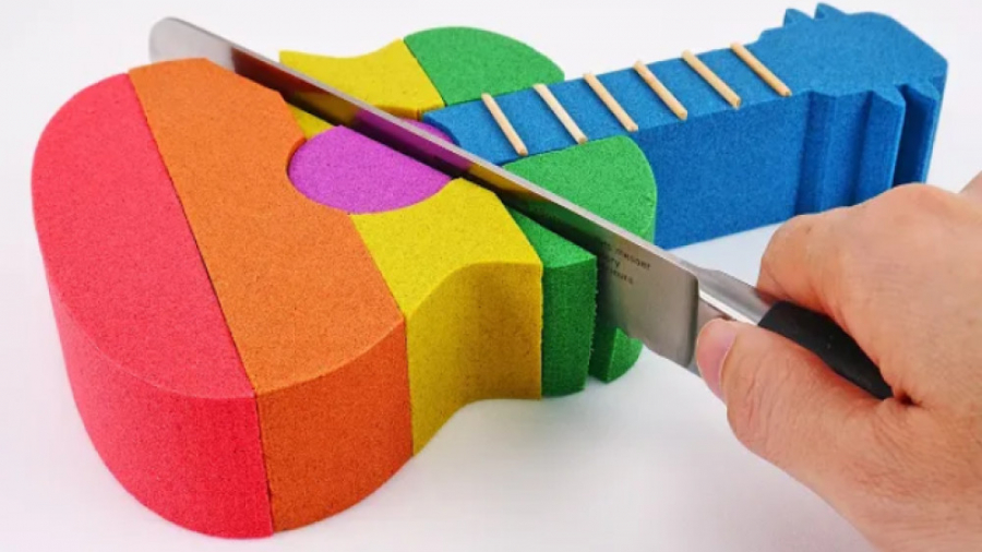 ساخت گیتار رنگی با ماسه های مت...