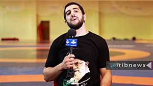 ارادت کشتی گیر و قهرمان جهان ب...